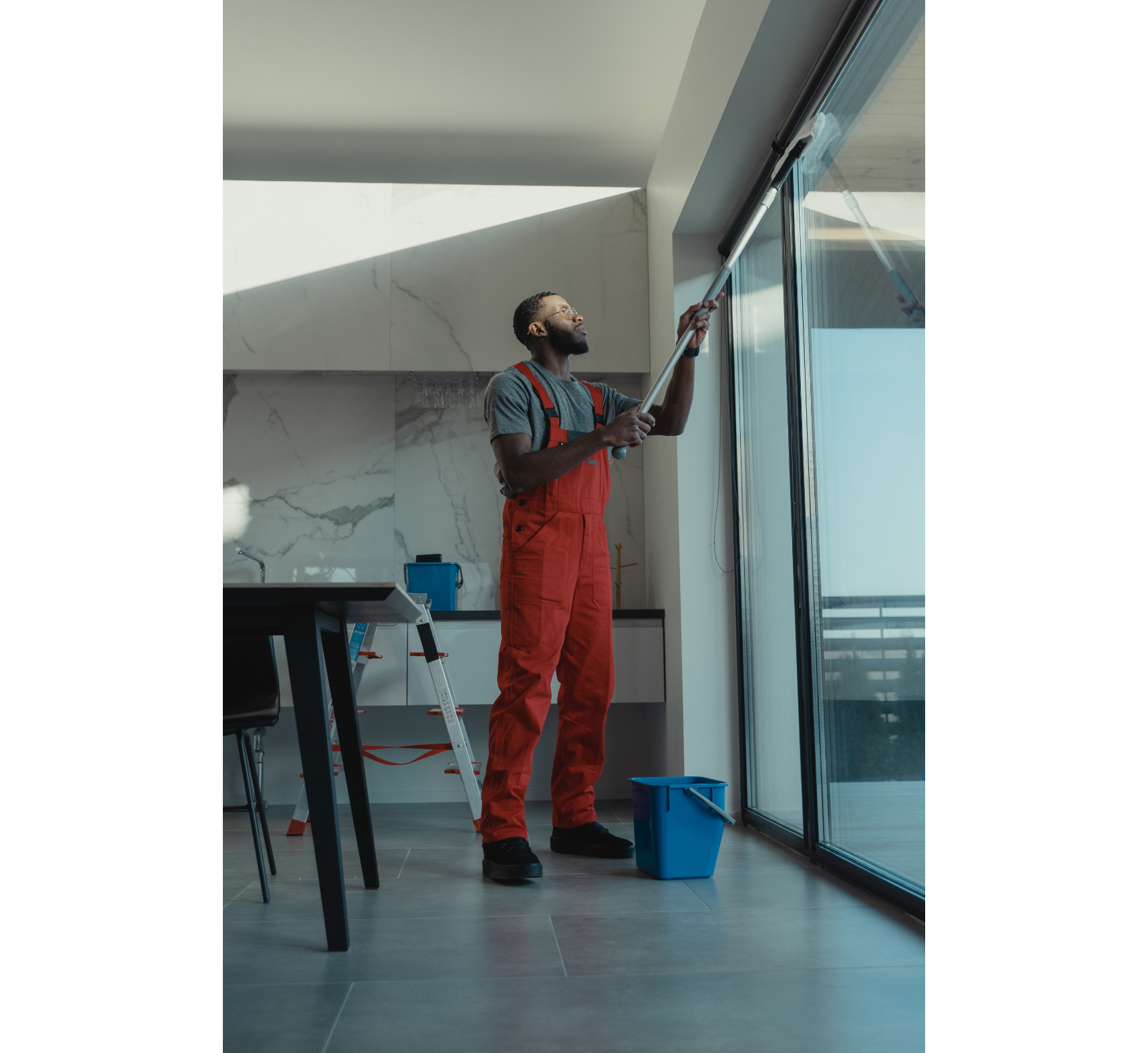 Man Cleaning window
